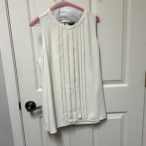 Brand: Ann Taylor off white sleeveless blouse. Size: Large.